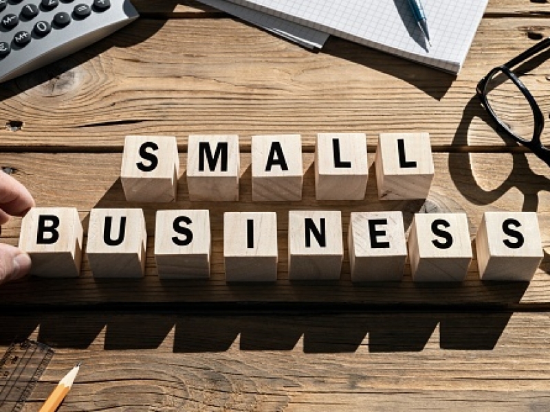 Small Business words on blocks SME and entrepreneur startup businesses concept