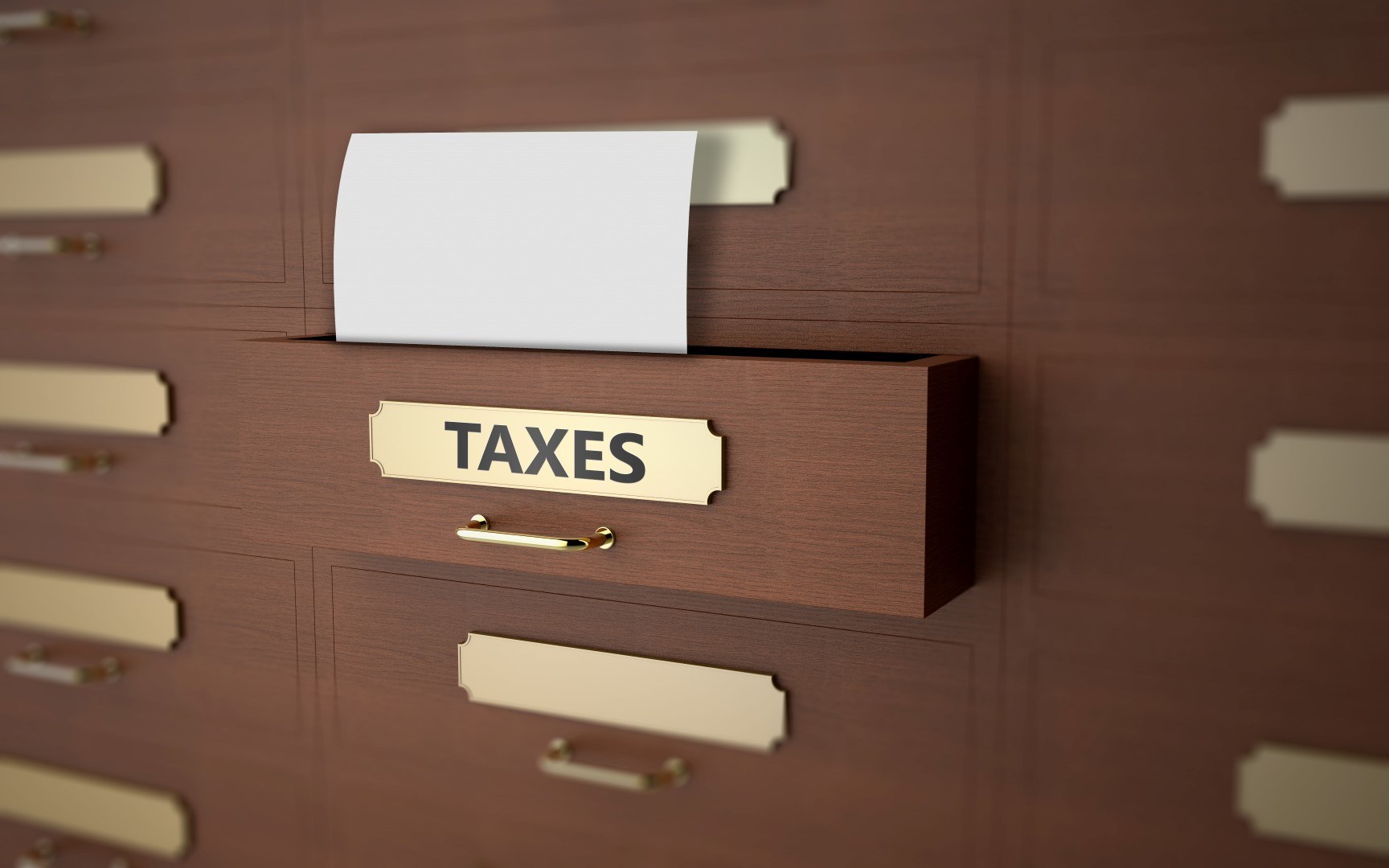 Office drawers with text on the subject of taxes