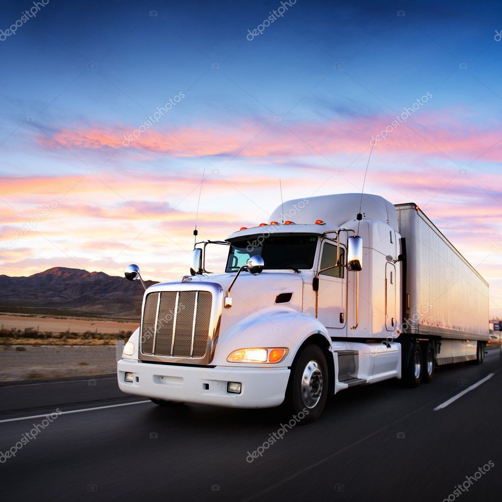 depositphotos_35619945-stock-photo-truck-and-highway-at-sunset