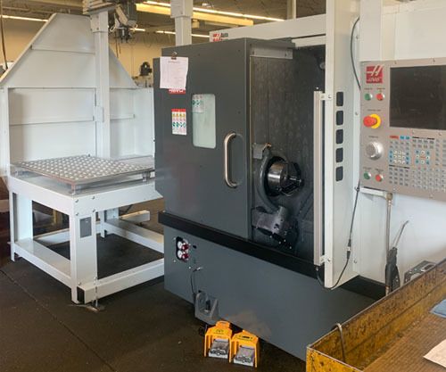 HAAS WITH AUTOMATIC LOADER 1