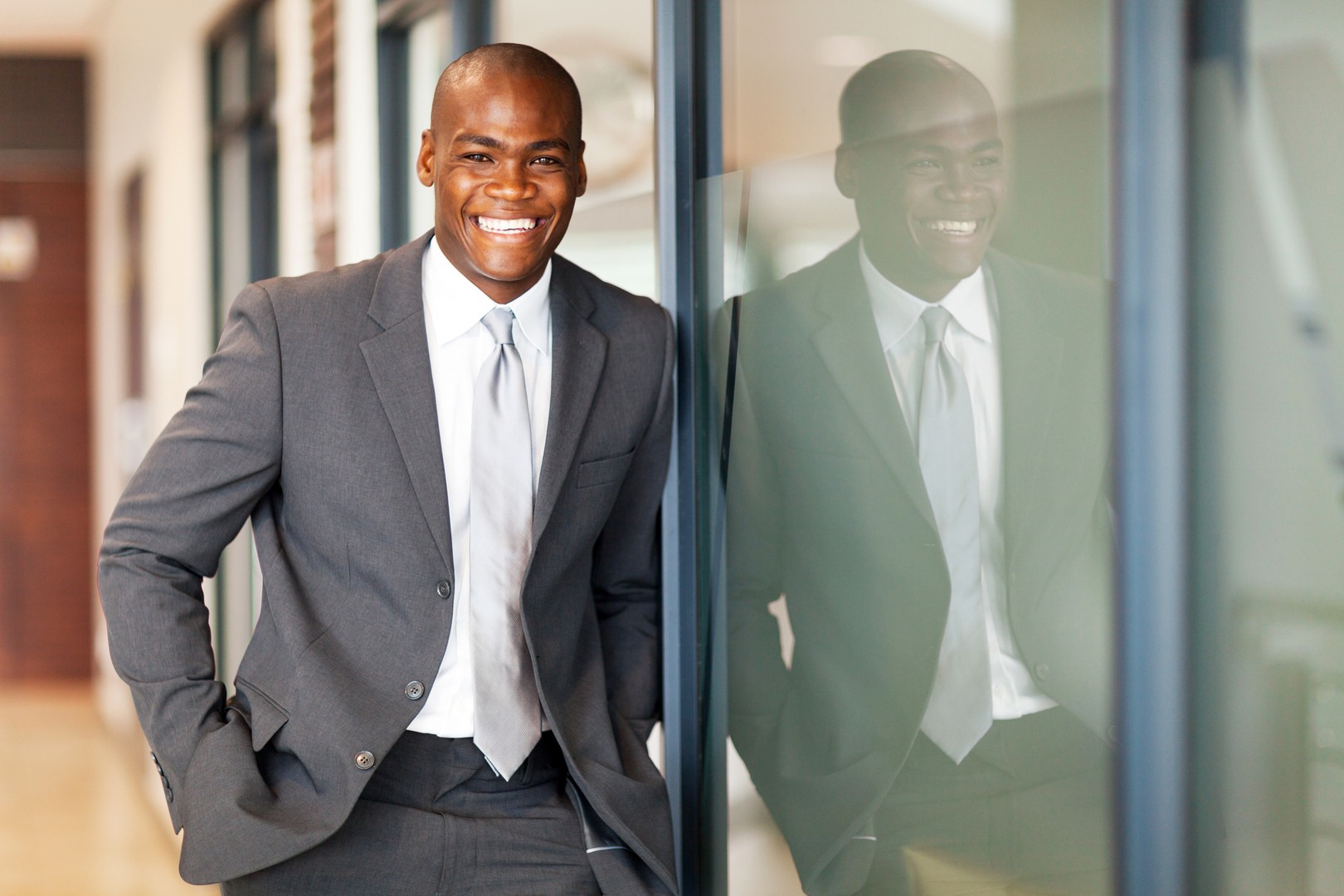 happy african american business executive portrait in office