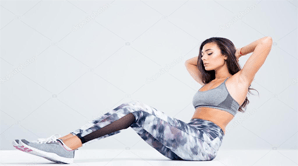 depositphotos_81253594-stock-photo-portrait-of-a-fitness-woman